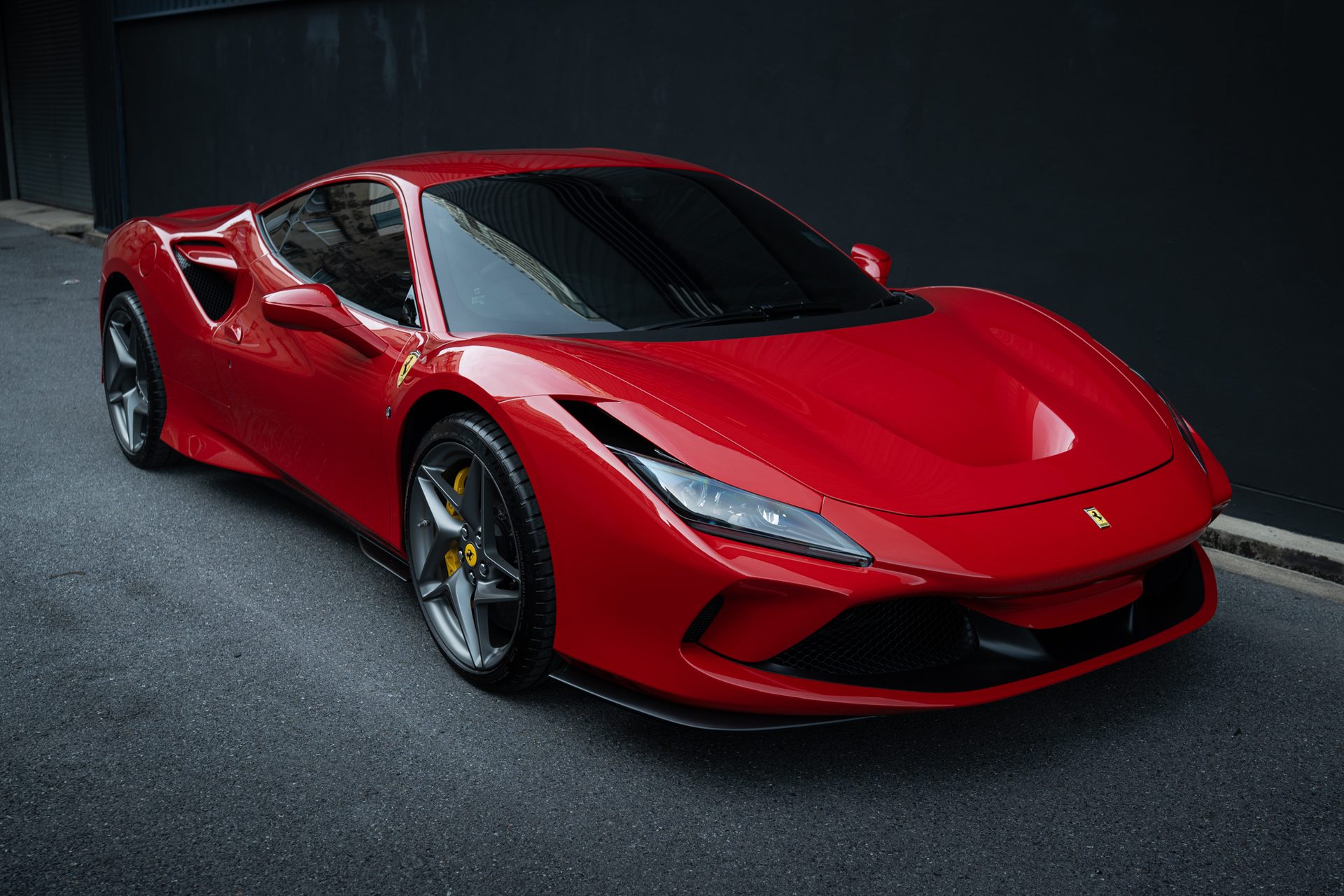 Ferrari F8 Tributo in Rosso Corsa — front three-quarter