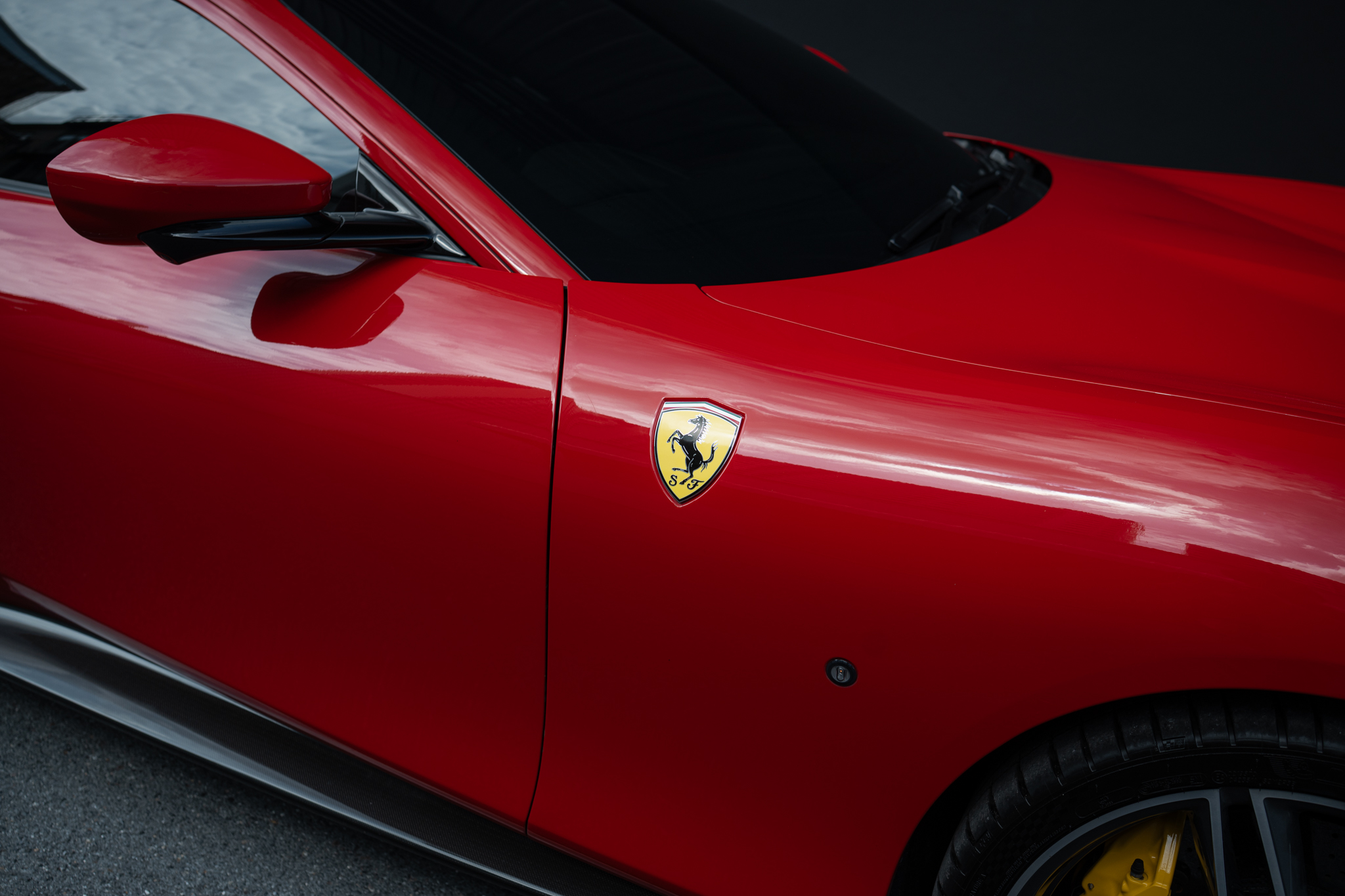 Ferrari Roma in Rosso Corsa, front three-quarter