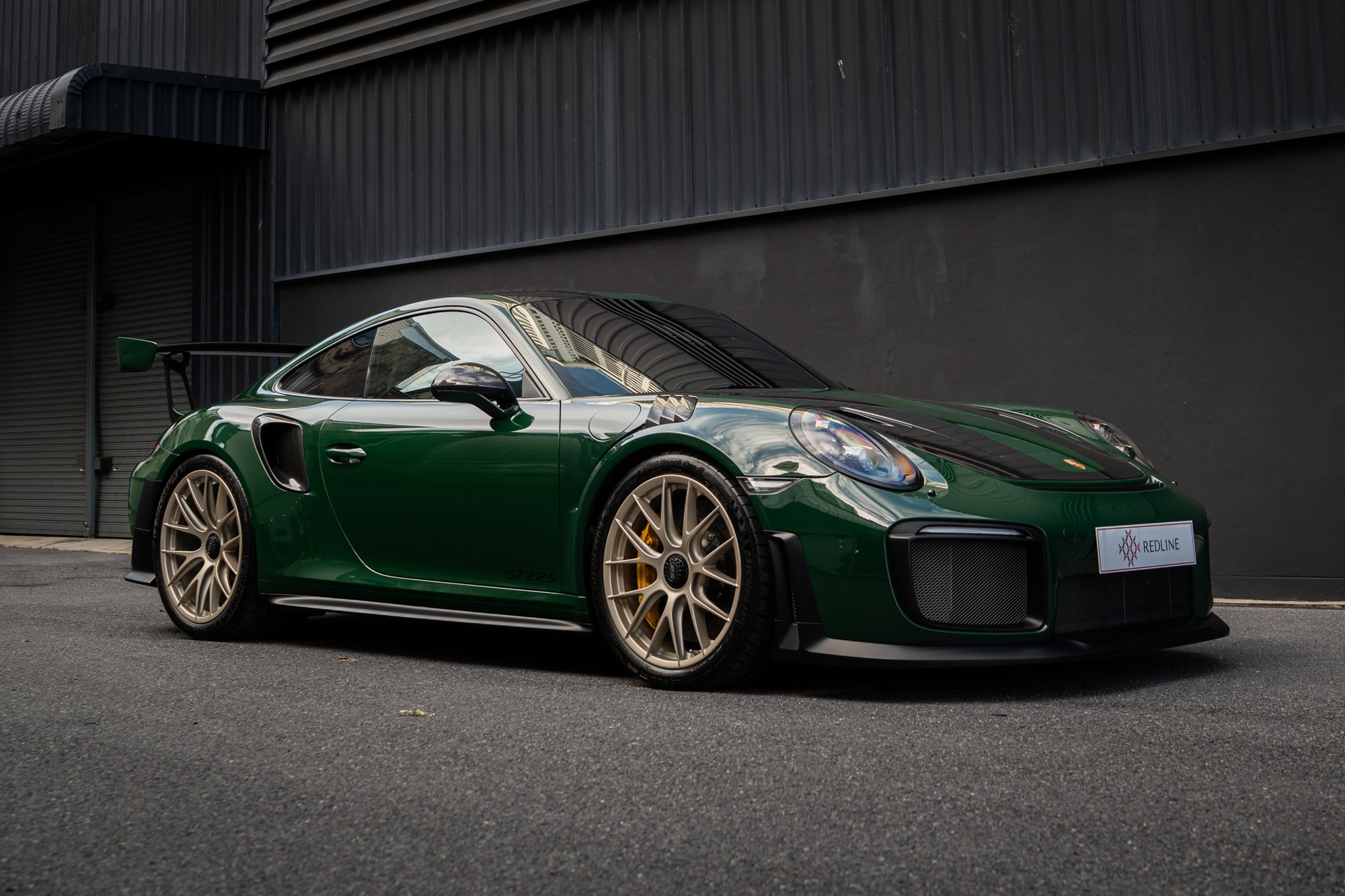 Porsche 911 GT2 RS in Irish Green over tartan