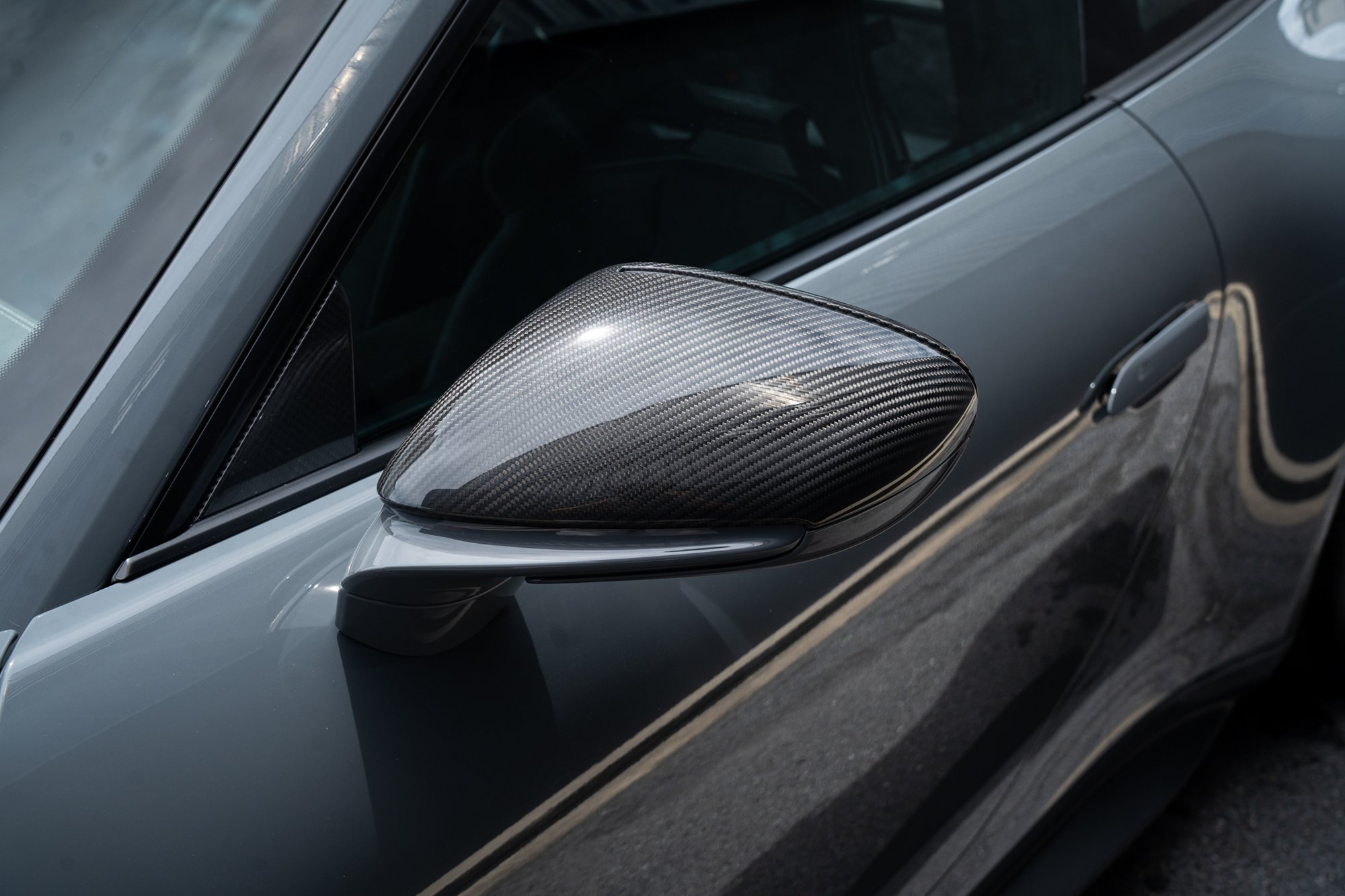 911 GT3 · ทุกกรัมมีความหมาย — กระจกมองข้างคาร์บอน